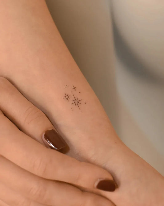 Tiny Minimalist Stars Tattoo on Women Arm by @muroxtattoo