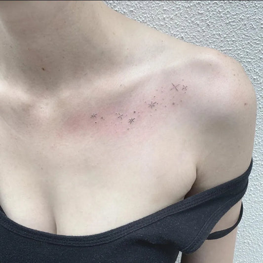 Tiny Minimalist Stars Tattoo on Women Collarbone by @freestyletattoostudio