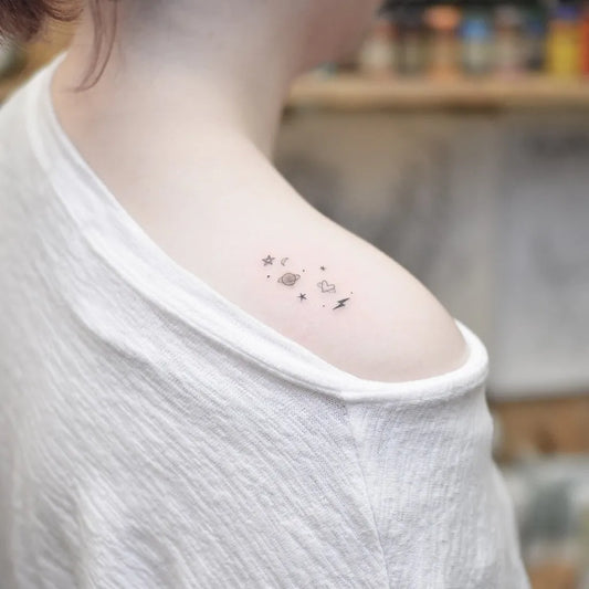 Tiny Minimalist Stars Tattoo on Women Shoulder by @tattoograin