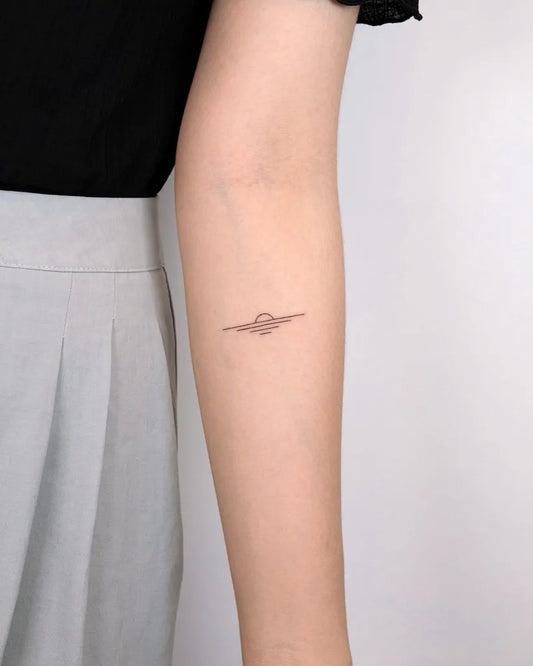 Tiny Minimalist Sun on Women Arm Tattoo by @handitrip