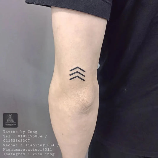 Tiny Minimalist Three Arrows Tattoo on Men Knee by @xiao_inng