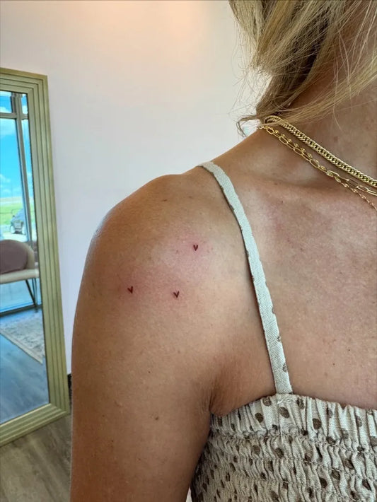 Tiny Minimalist Three Hearts on Women Shoulder Tattoo by @ever.inktattoo