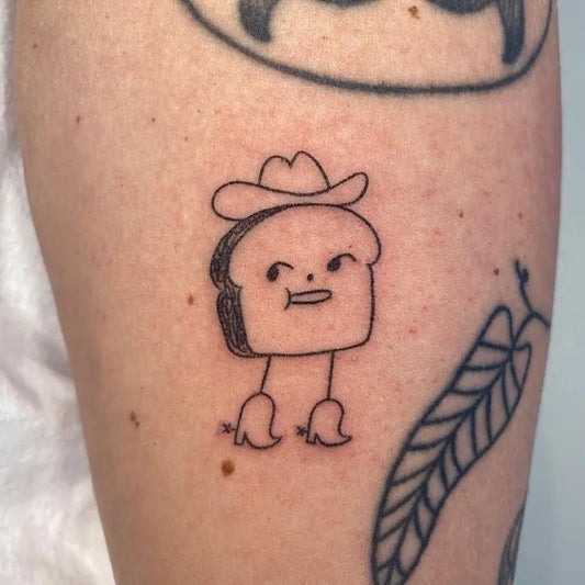 Tiny Minimalist Toast on Women Arm Tattoo by @foodie.tattoos