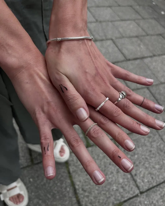 Tiny Minimalist Tribal Marks on Women Fingers Tattoo by @inechu.ttt