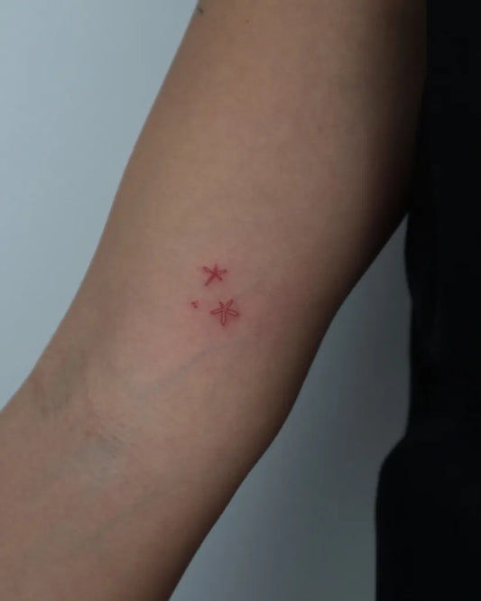 Tiny Minimalist Two Stars on Women Arm Tattoo by @kefihandpoke