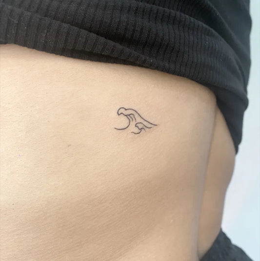 Tiny Minimalist Wave on Women Hip Tattoo by @polonia.tattoo