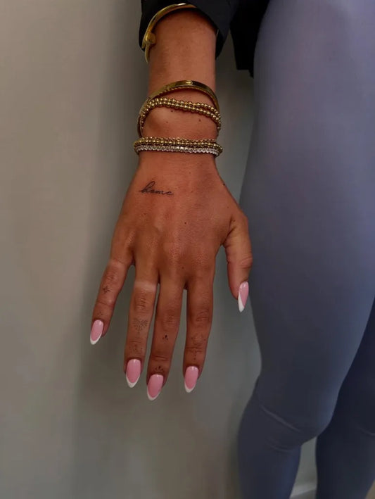 Tiny Minimalist Word on Women Fingers Tattoo by @doverinkk