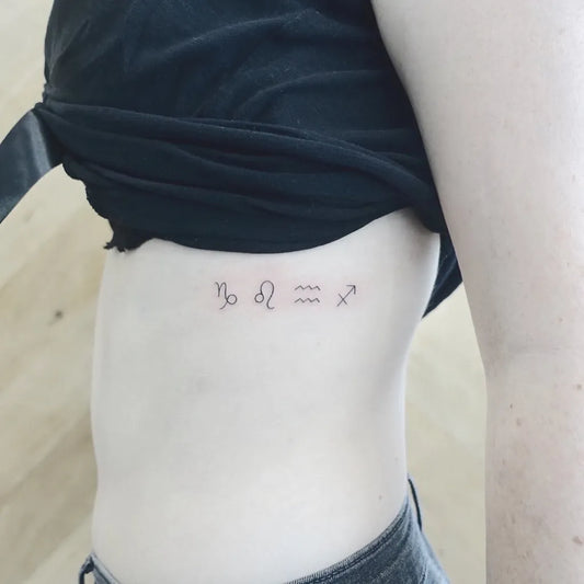Tiny Minimalist Zodiac Symbols Tattoo on Women Rib by @eagletatt
