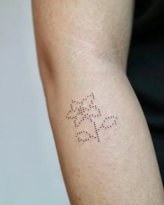 Tiny Minimalist pixel flower on Women forearm Tattoo by @takemymuse