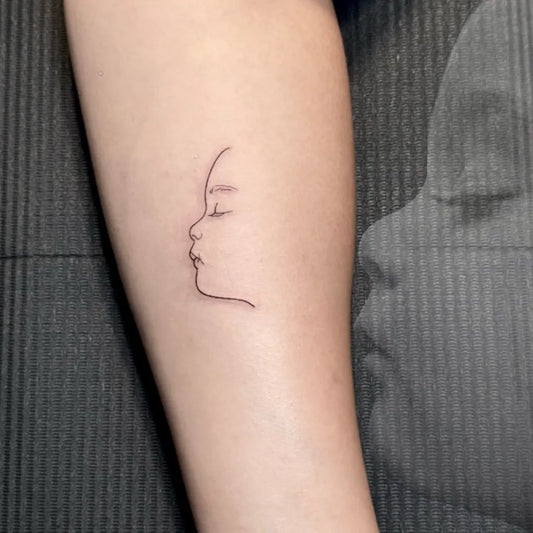 Tiny Outline FemaleProfile Tattoo on Women Arm by @nourbeautylounge_