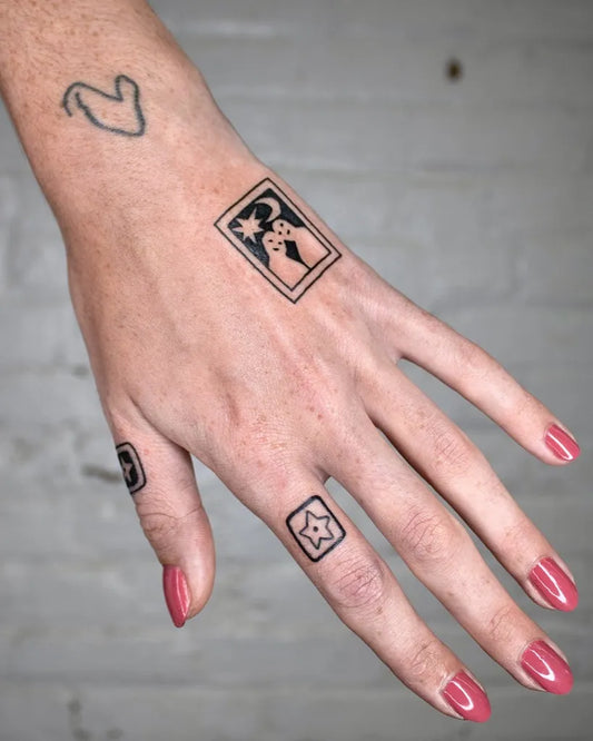 Tiny Patchwork duck silhouette framed moon couple star squares on Women Hand Tattoo by @luwalstad
