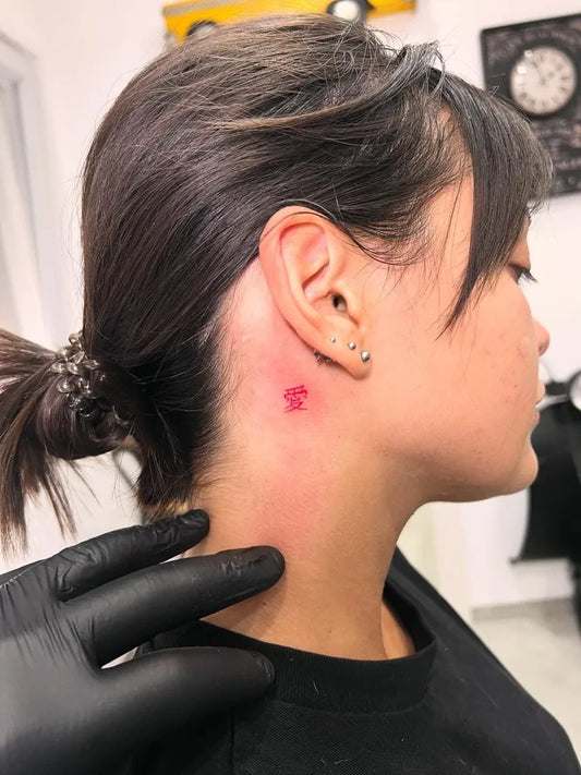 Tiny Red Star Tattoo on Women Neck by @alfredocitarella