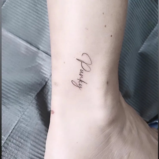 Tiny Script Punky Women Ankle Tattoo by @micromark_ink
