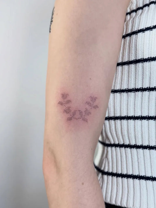 Tiny Stick and Poke Floral Sprig Tattoo on Women Arm by @ell1tatts