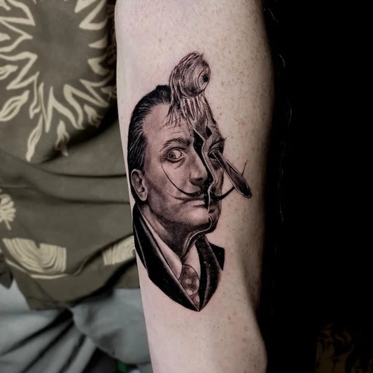 black and grey realism Salvador Dali creepy eyeball portrait tattoo on arm