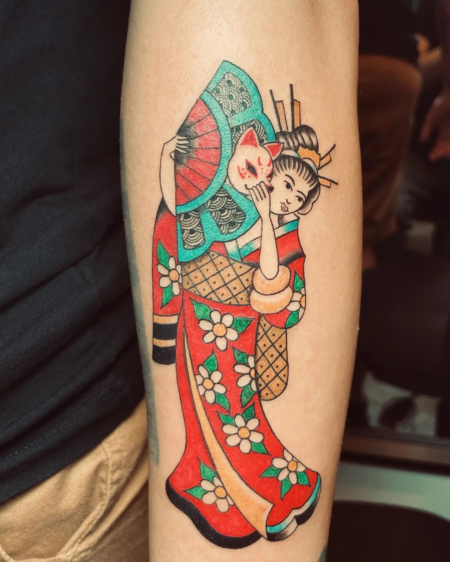 japanese tattoo of a woman in a red kimono on forearm