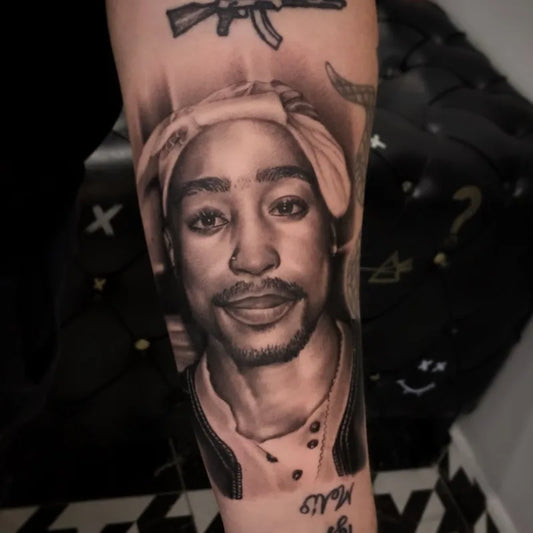 Tupac Shakur 2Pac black and grey realism portrait memorial tattoo