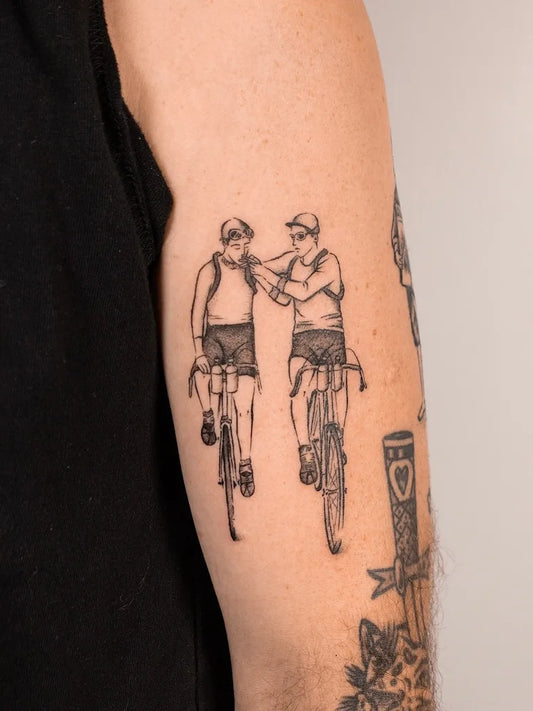 boys riding bicycle tattoo
