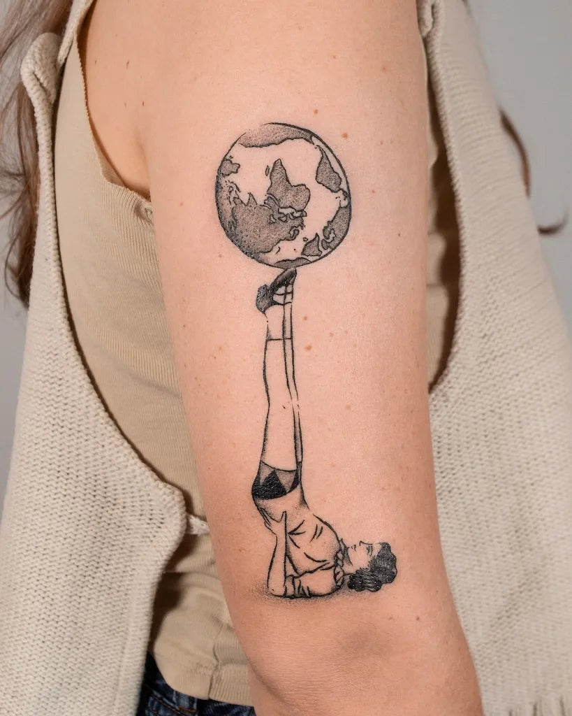 abstract globe yoga ball tattoo