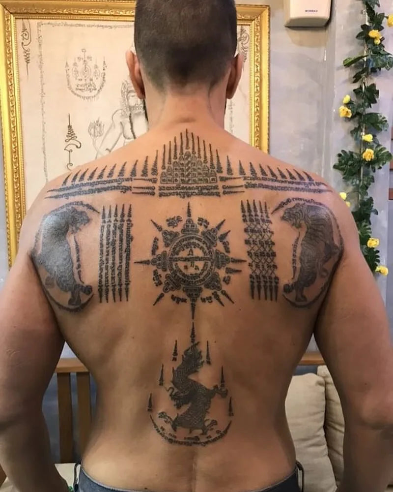 thai sak yant tattoo on man back