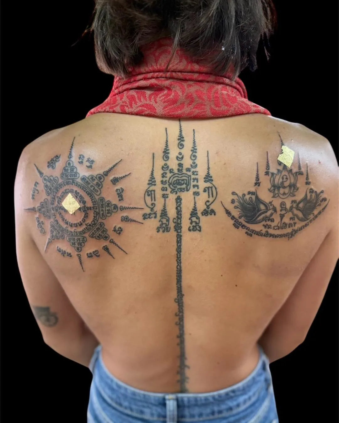 thai sak yant tattoo on man back
