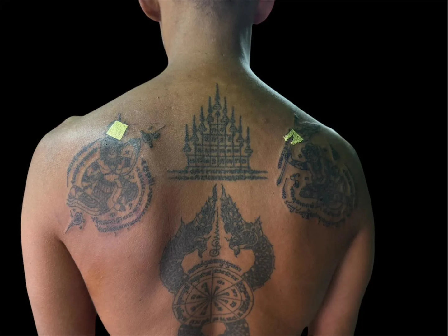 thai sak yant tattoo on man back