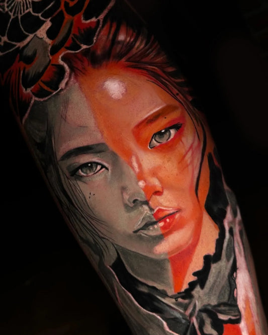 asian woman face portrait black and orange color tattoo