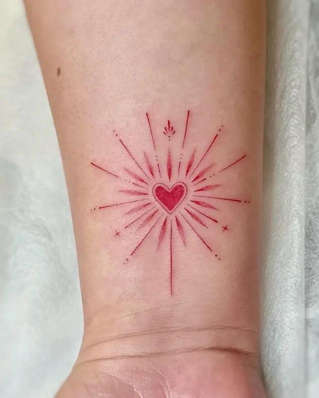 red heart burst tattoo