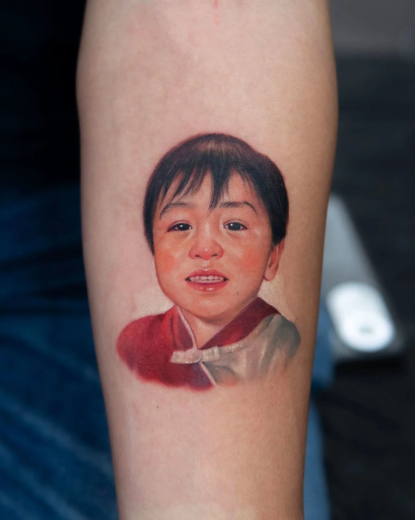 realistic thai kid portrait tattoo