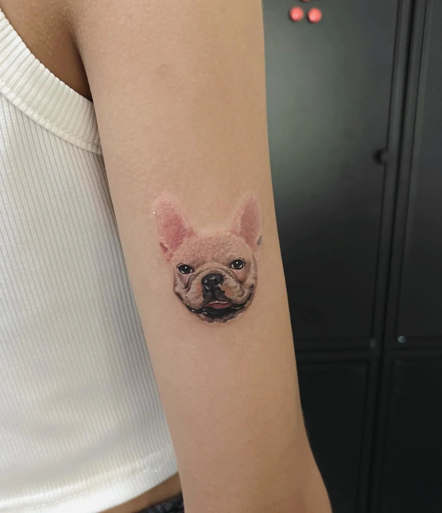realistic dog portrait upper arm tattoo