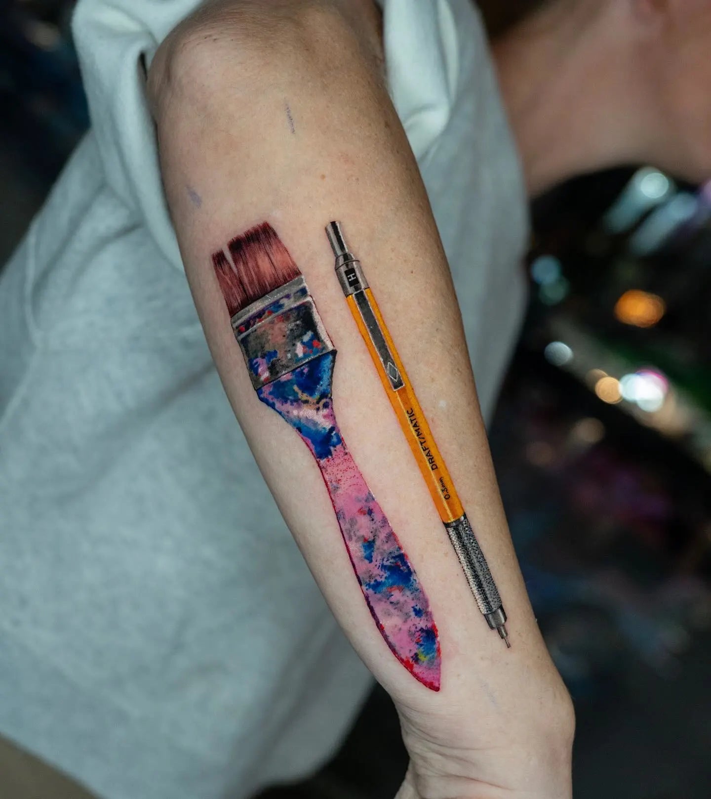 realistic painting brush and pen tattoo