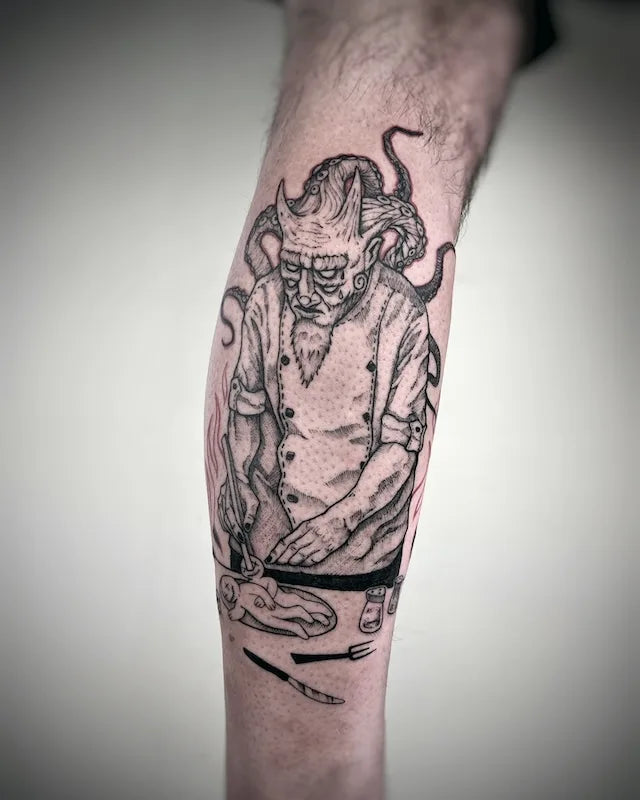 black and grey creepy chef devil darkwork tattoo on man leg