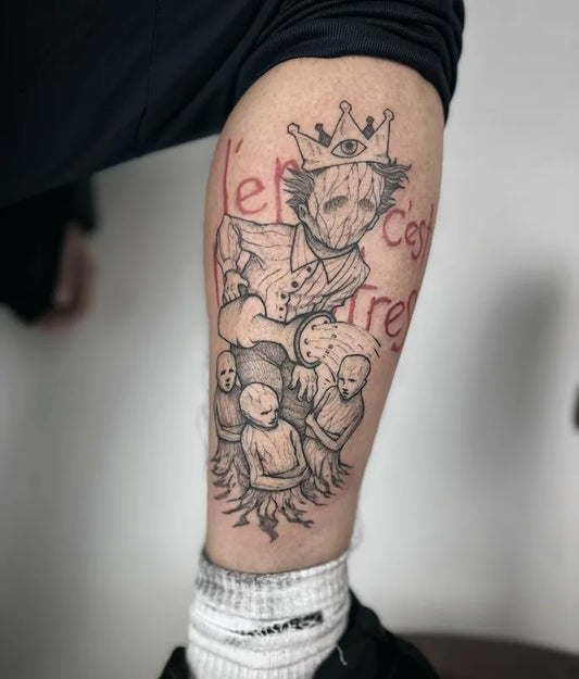 black and grey abstract illustrative freehand tattoo on man leg