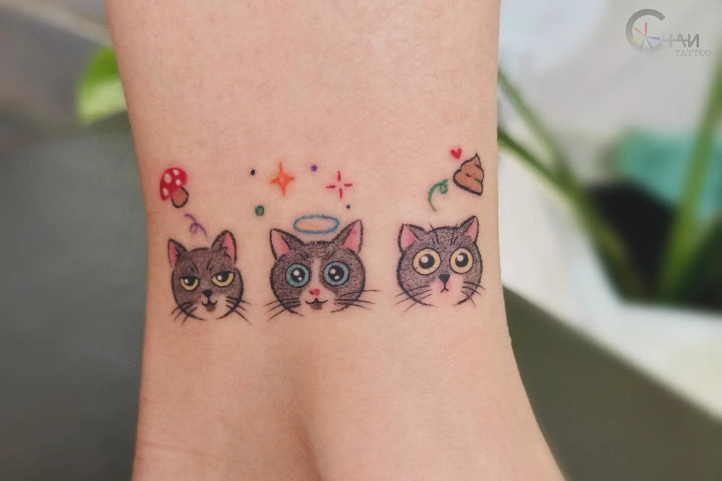 three cute cartoon cats colorful minimalist tattoo