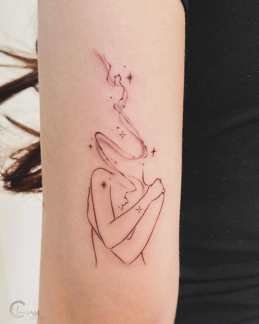 abstract fine line headless woman tattoo on upper arm