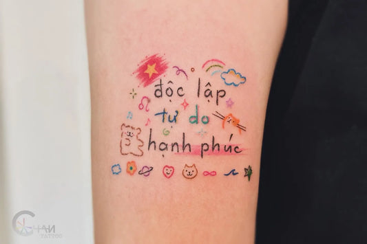 cute colorful minimalist with lettering tattoo on woman arm