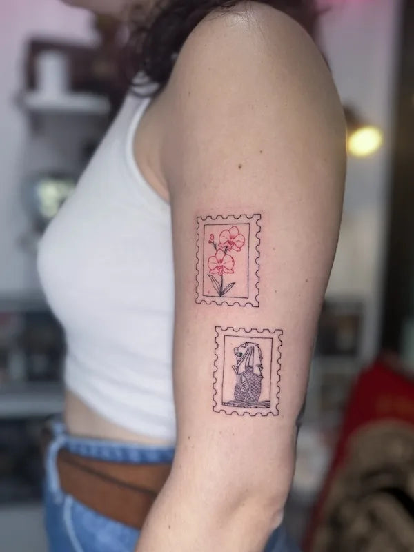 singapore merlion postage stamps outline tattoo on woman upper arm