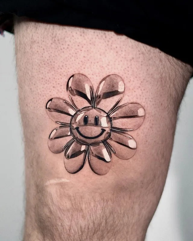 black and grey realism gd flower tattoo on thigh