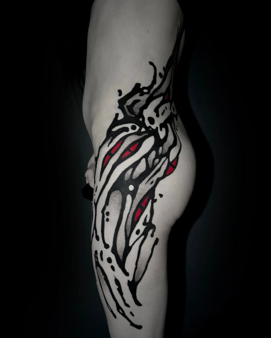 blackwork red abstract hip body tattoo