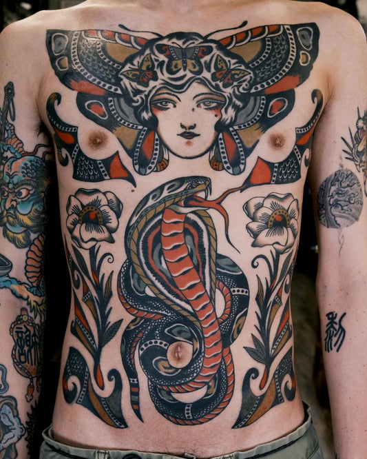 traditional patchwork tattoos on man body
