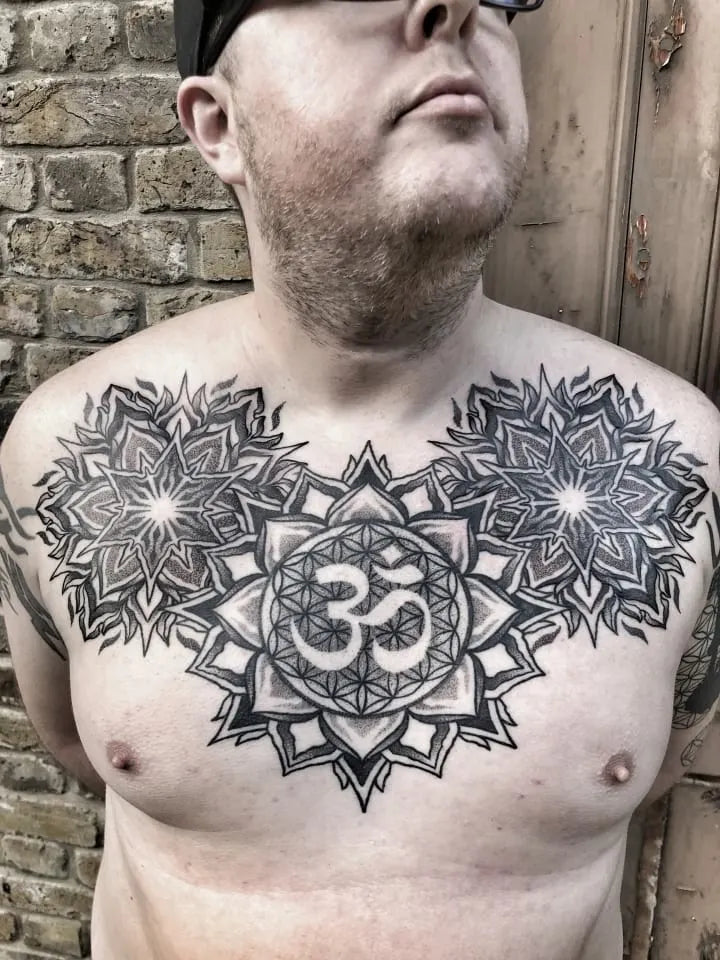 3 geometric mandala om tattoo on man chest