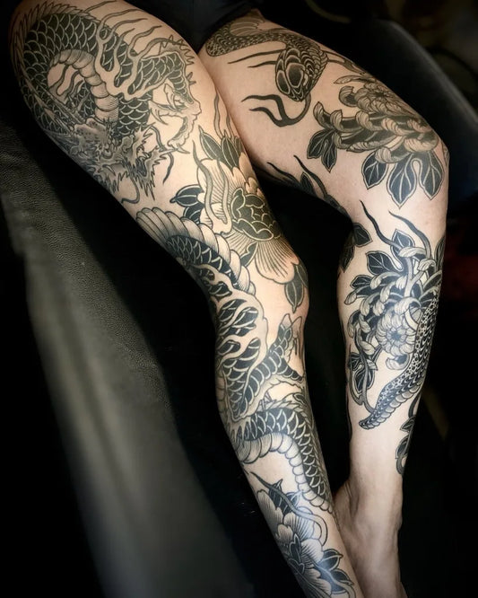 japanese irezumi black and white woman leg tattoo