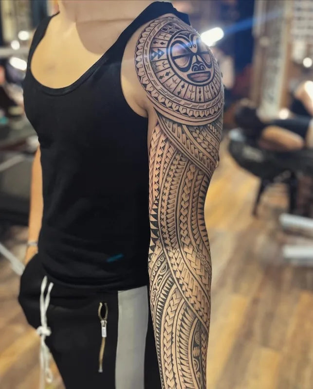 polynesian tribal tattoo man full arm sleeve
