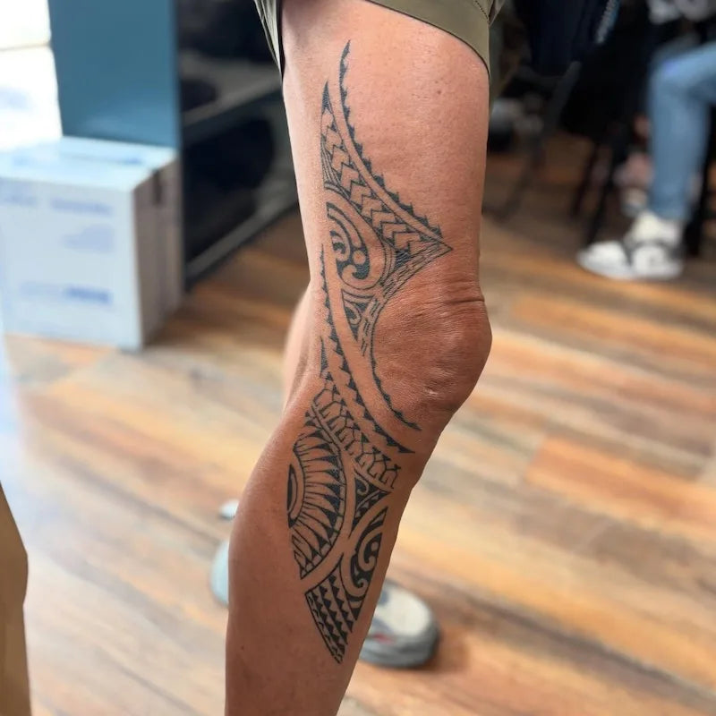 polynesian tribal tattoo on leg