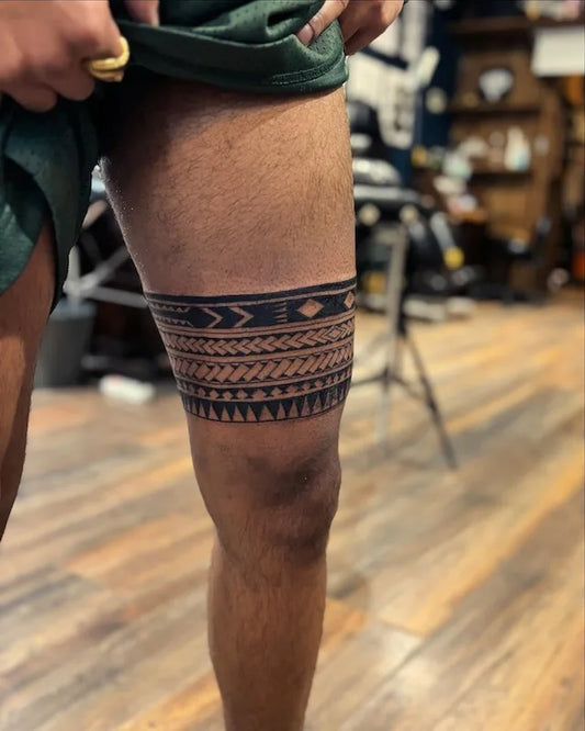 polynesian tribal leg band tattoo on thigh