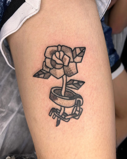 simple abstract geometric rose dotwork tattoo