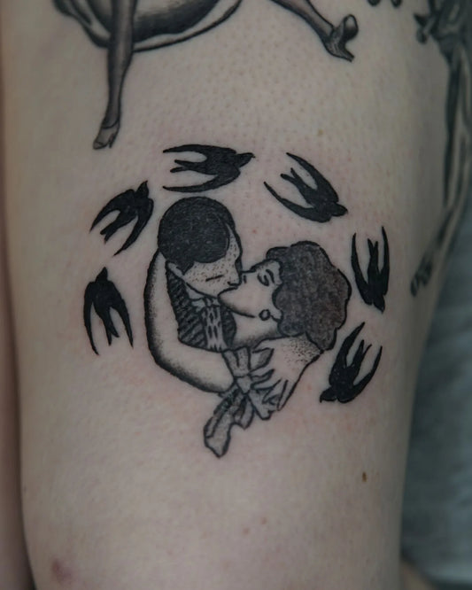 couple french kissing with birds dotwork tattoo