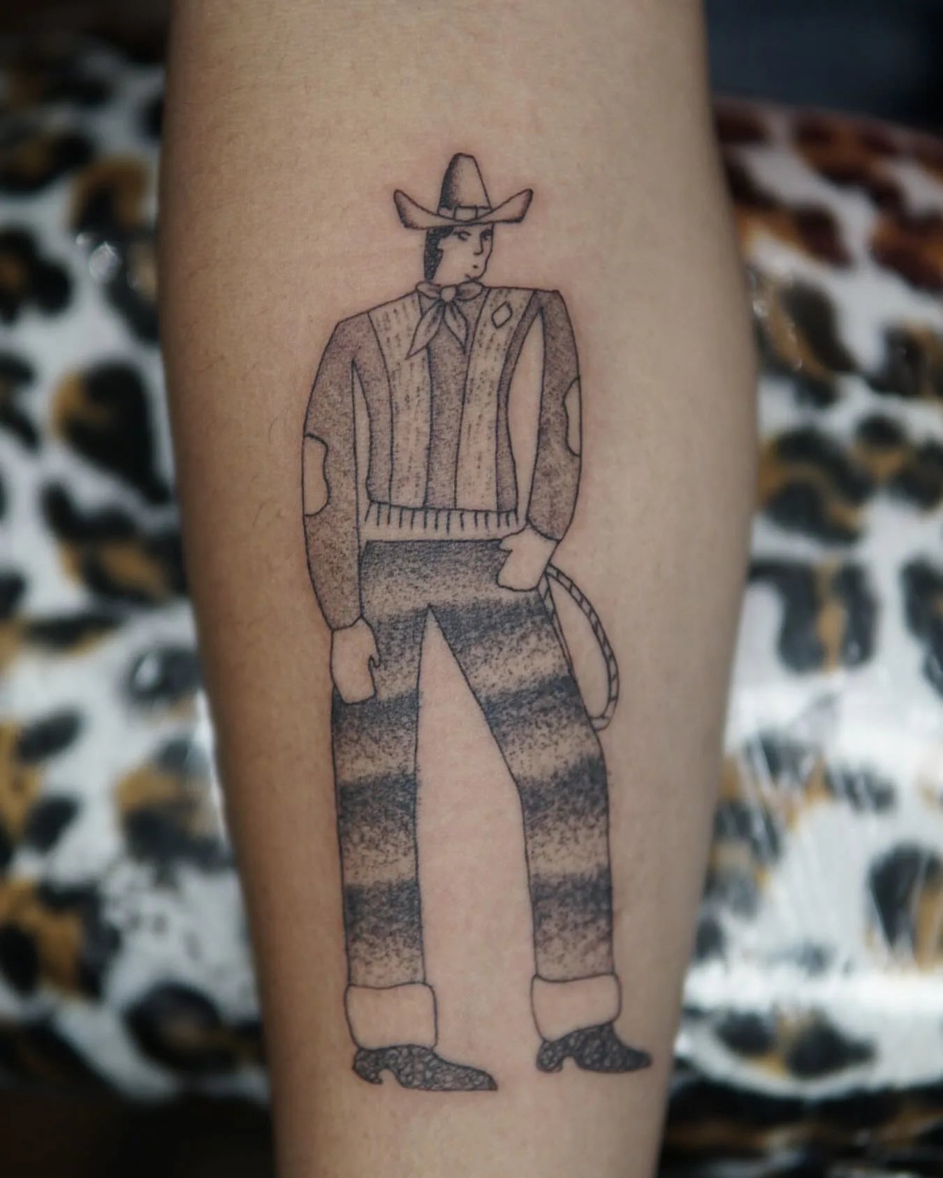 abstract tall man with cowboy hat black and grey dotwork tattoo
