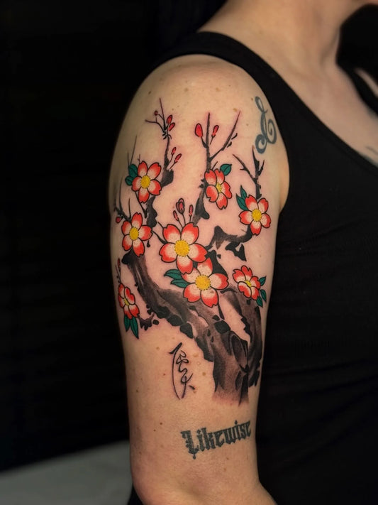 japanese colorful cherry blossom tattoo on upper arm