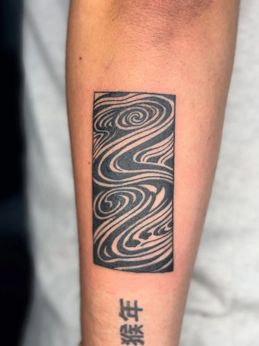 abstract blackwork lines rectangle tattoo on forearm